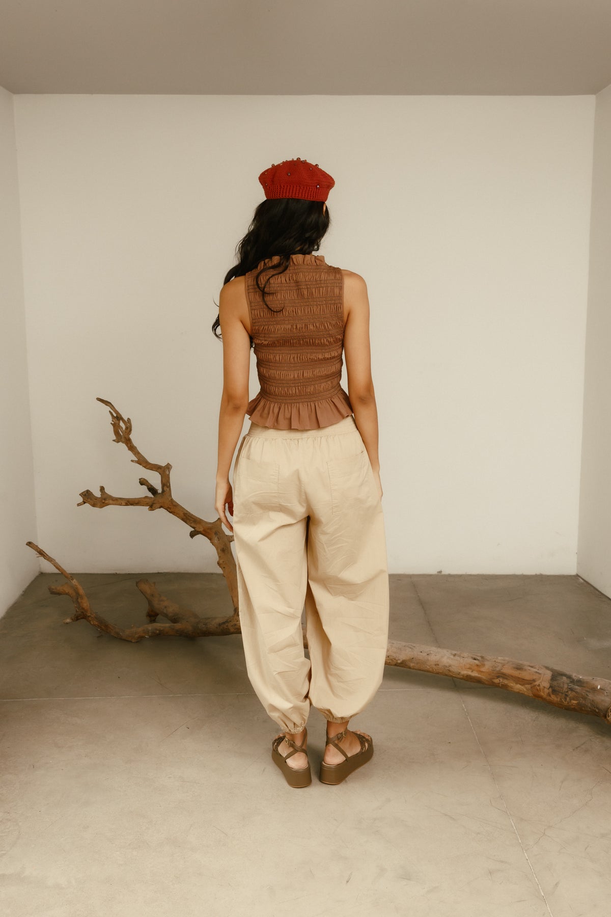 Blusa Raíces encauchada café